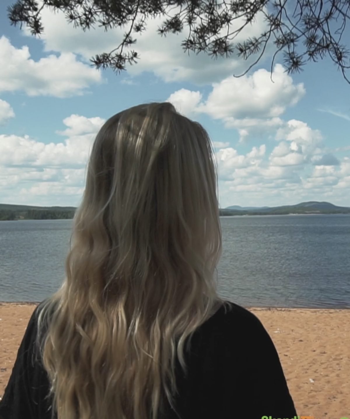 woman beach looking behind
